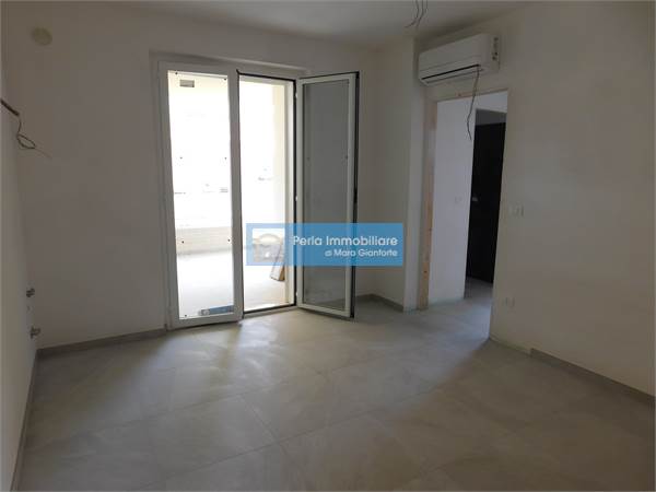 APPARTAMENTO CON TERRAZZO E POSTO AUTO
